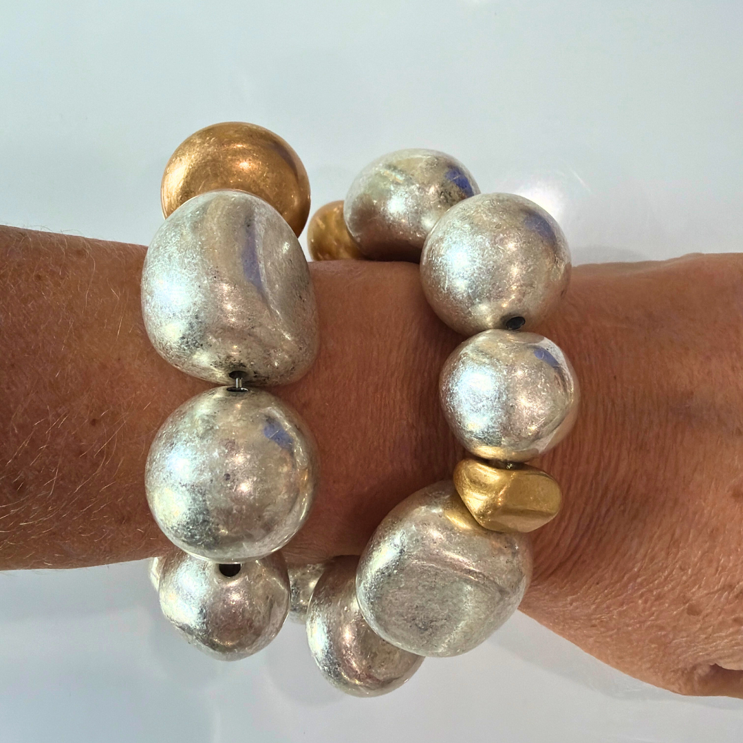 Pulsera dorada y plateada