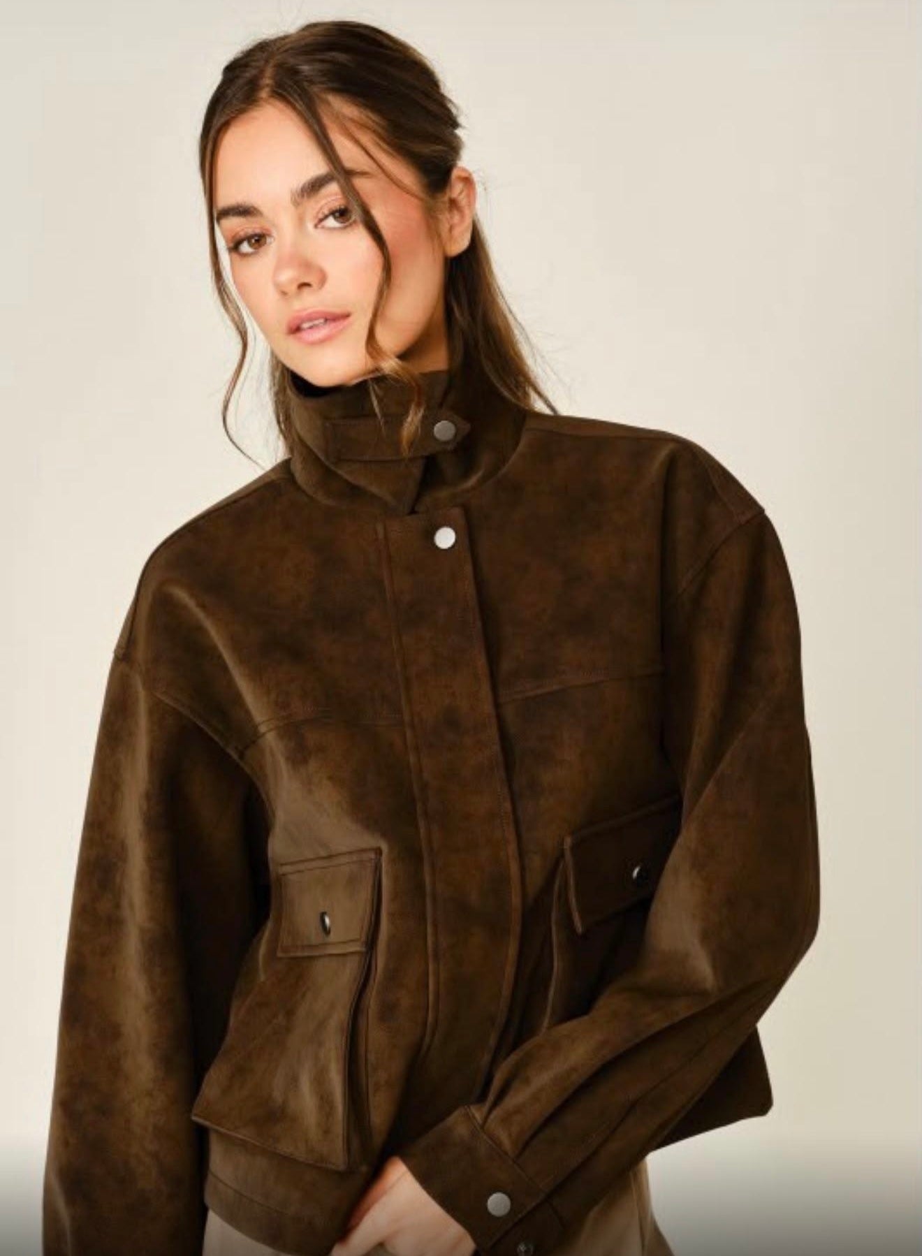 Woman wearing Sienna navy suede bomber jacket with zip front and utility pockets PS Showroom