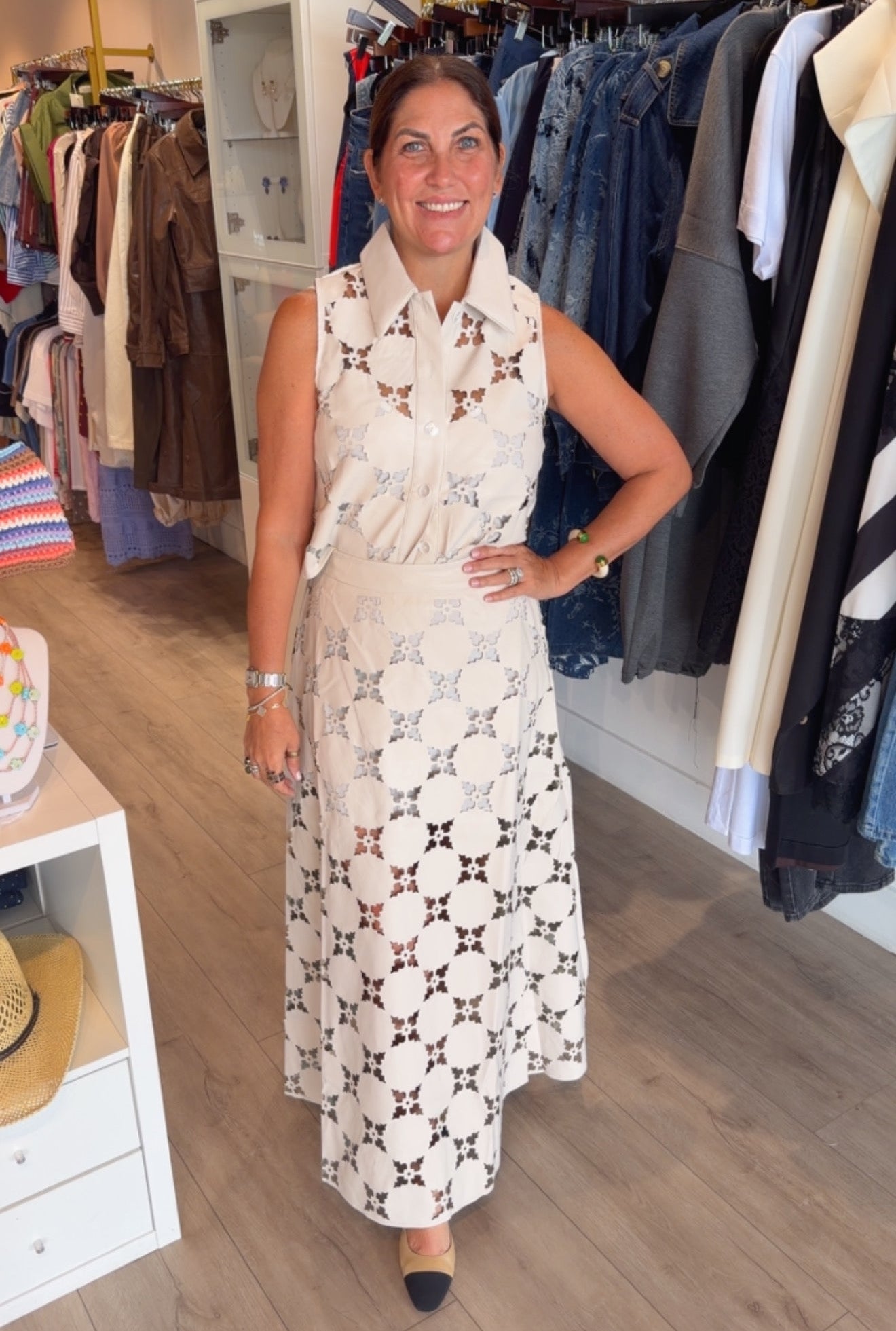 Woman wearing Valentina laser-cut sleeveless top and matching maxi skirt set PS Showroom