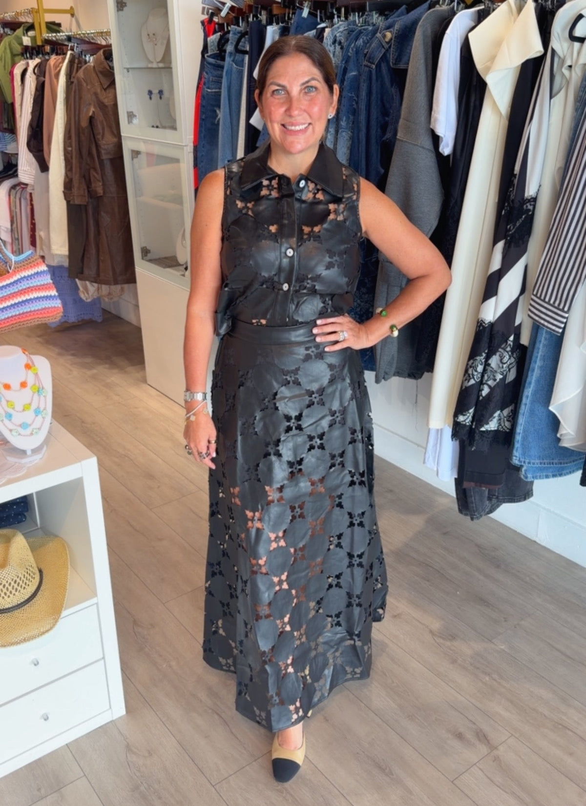 Woman wearing Valentina laser-cut sleeveless top and matching maxi skirt set PS Showroom