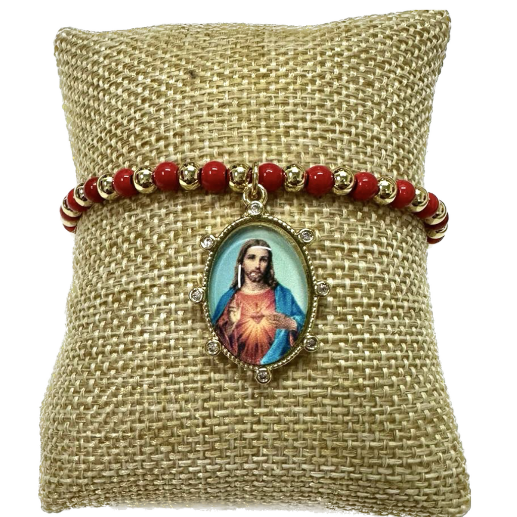 Pulsera dorada con rojo y medalla religiosa