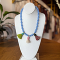 Collar de cristales con borlas