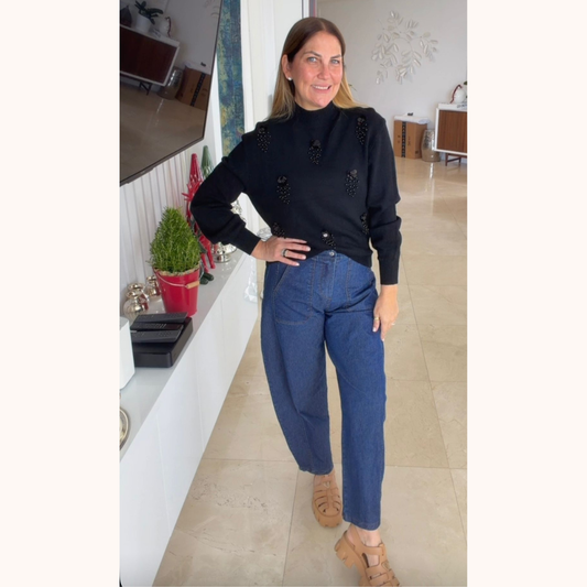 Suéter de lana con perlas y lentejuelas