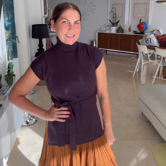 Suéter sin mangas con abertura a los lados